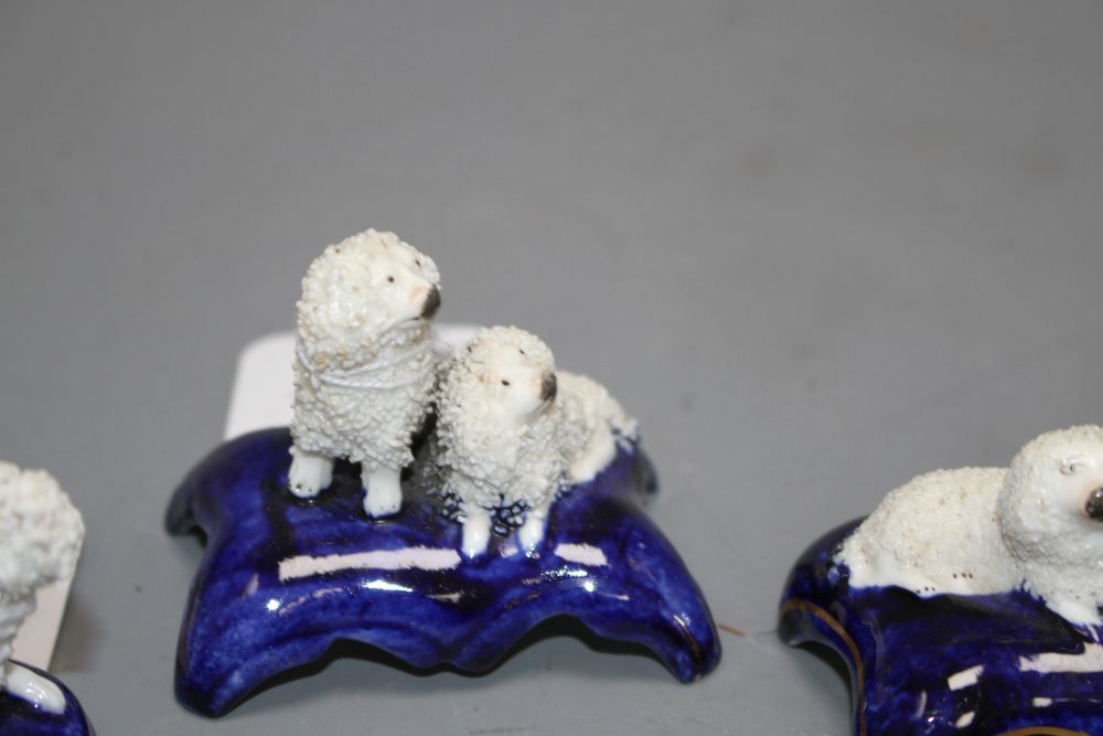 Five Staffordshire porcelain toy groups of poodles, c. 1840-50, the majority by Dudson, H. 4.2 - 5.2cm